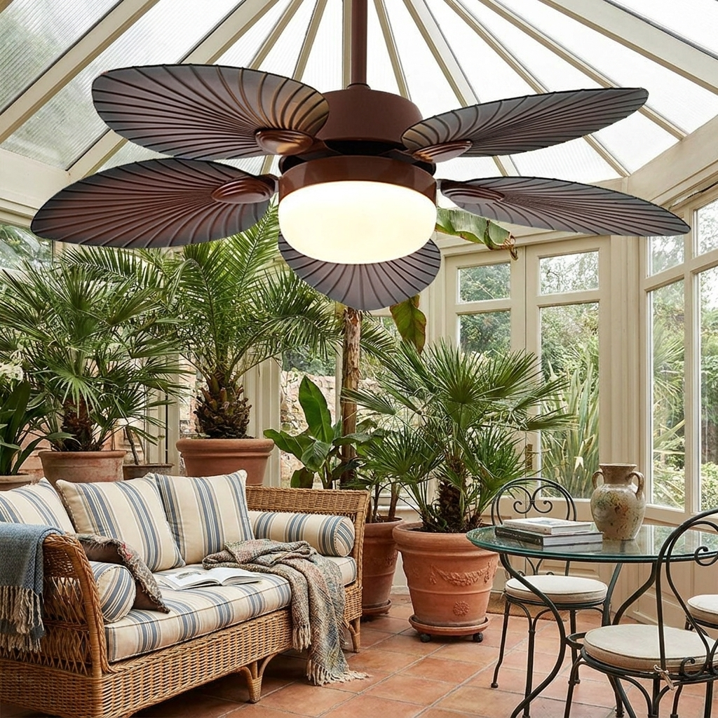Quenby antique banana leaf ceiling fan light in a garden sunroom with palms
