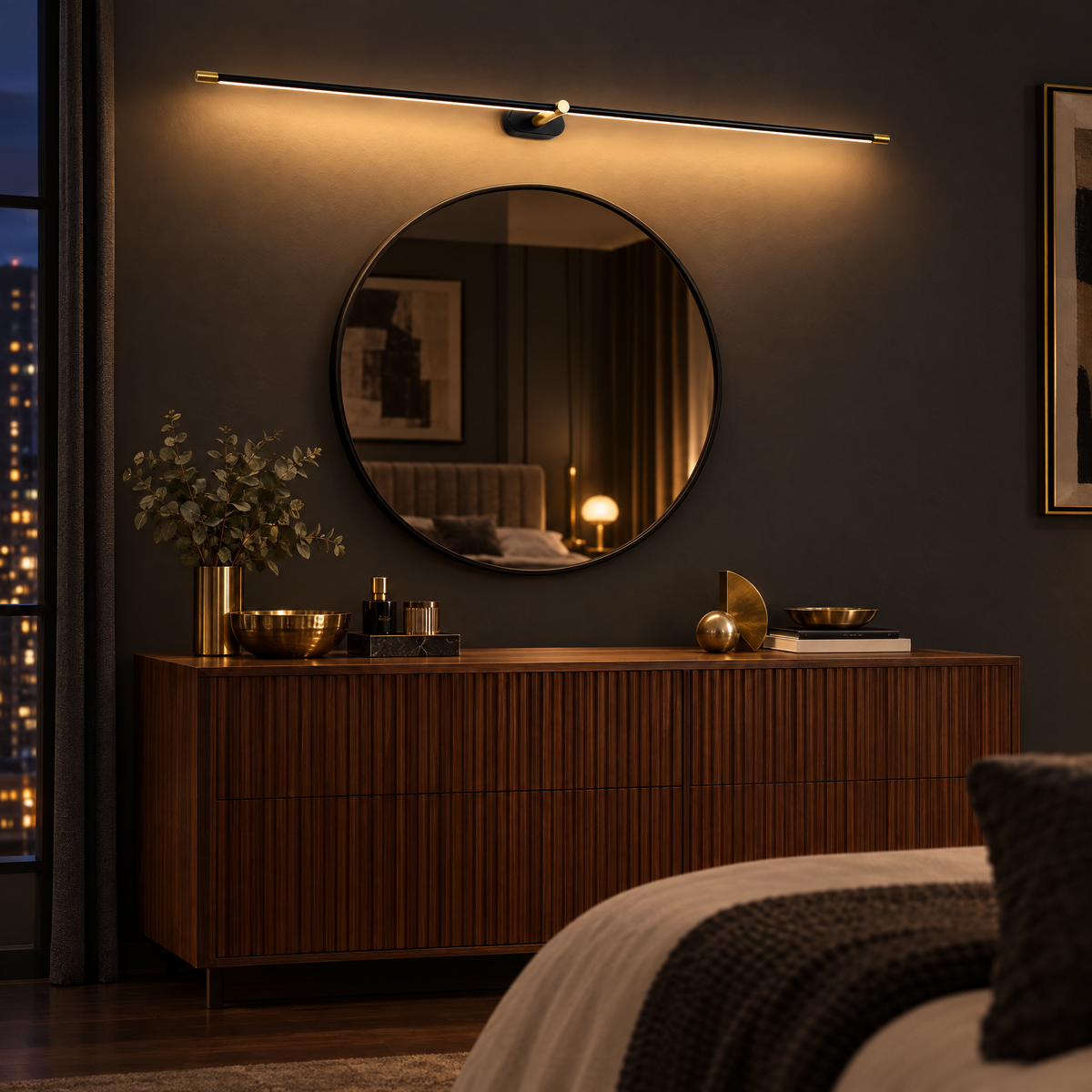 Kova Rechargeable Linear Wall Light in Black and Gold above a mirror and walnut dresser