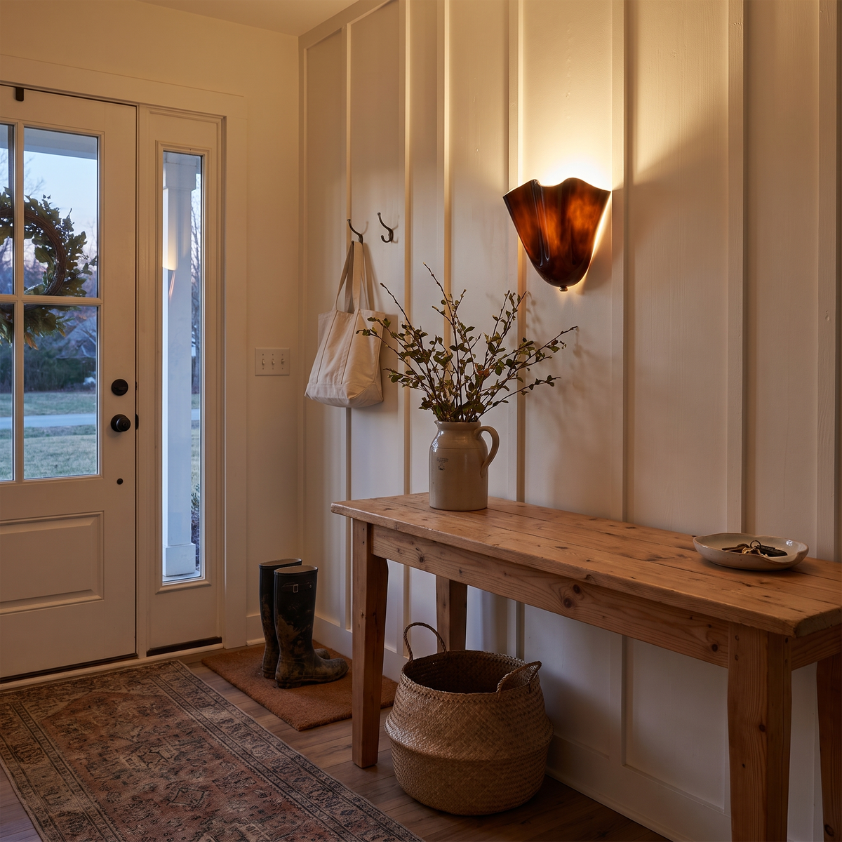 Petalia Brown glass wall sconce in a farmhouse entry hall