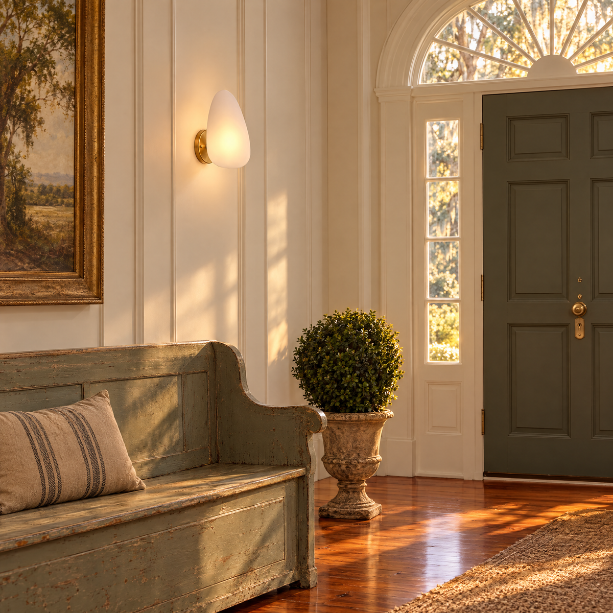 Opaline wall sconce in White & Gold, shape ∅7.1" x H11.8" in a Southern plantation-style entryway