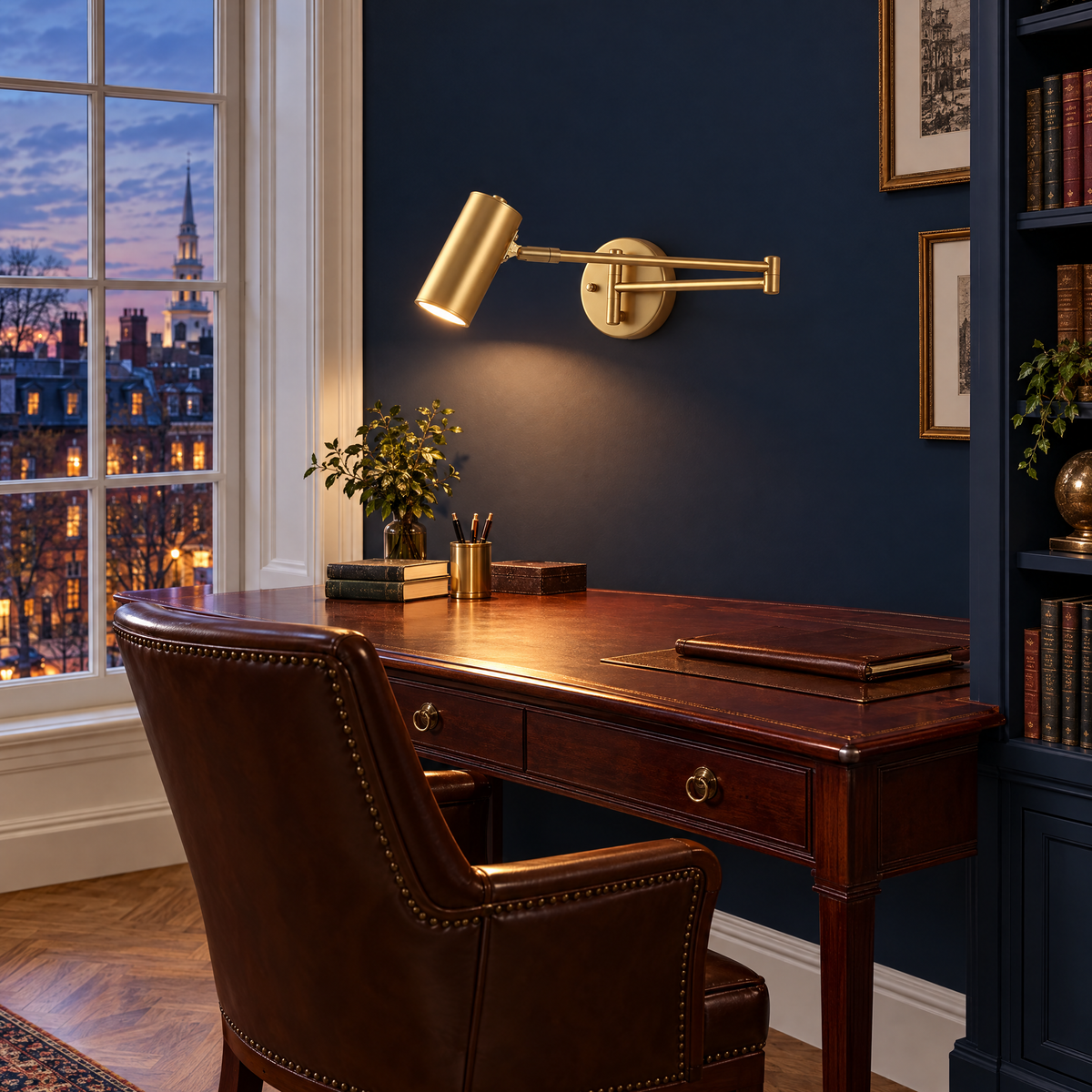 Tilda swing arm wall sconce in gold above a desk in a Boston Georgian townhouse office