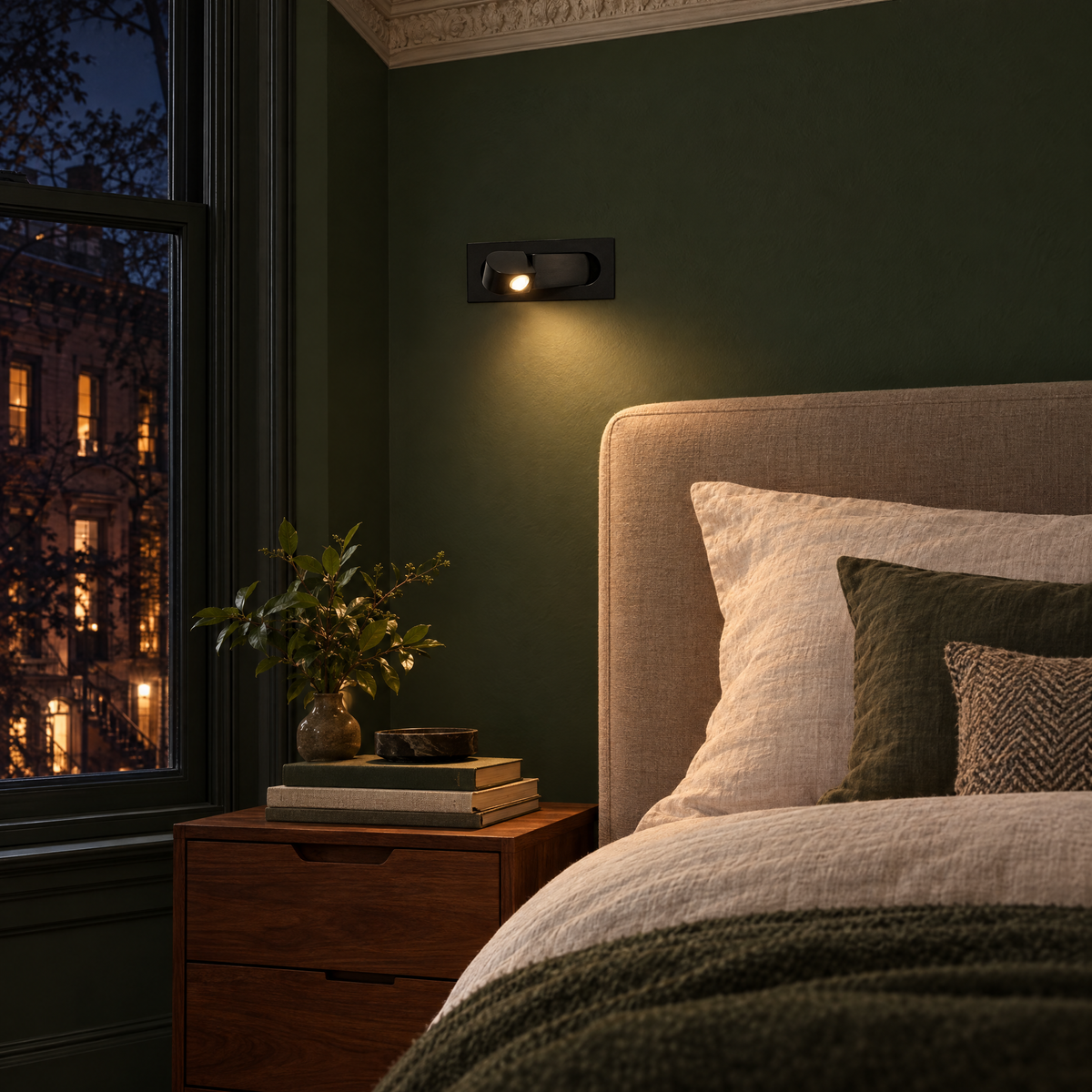 Lectra bedside reading wall light in matte black in a Brooklyn brownstone bedroom