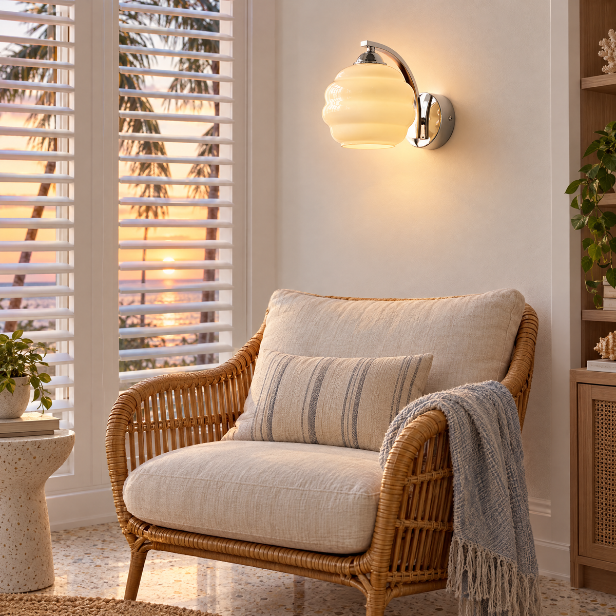 Deauville Art Deco wall sconce in Chrome & Beige Glass in a Florida coastal home reading nook