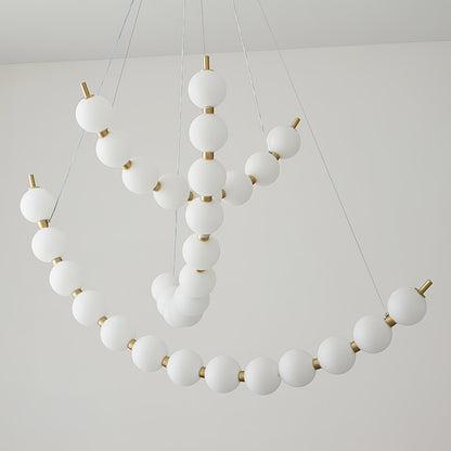 Coralyn Brass Acrylic Pearl LED Chandelier