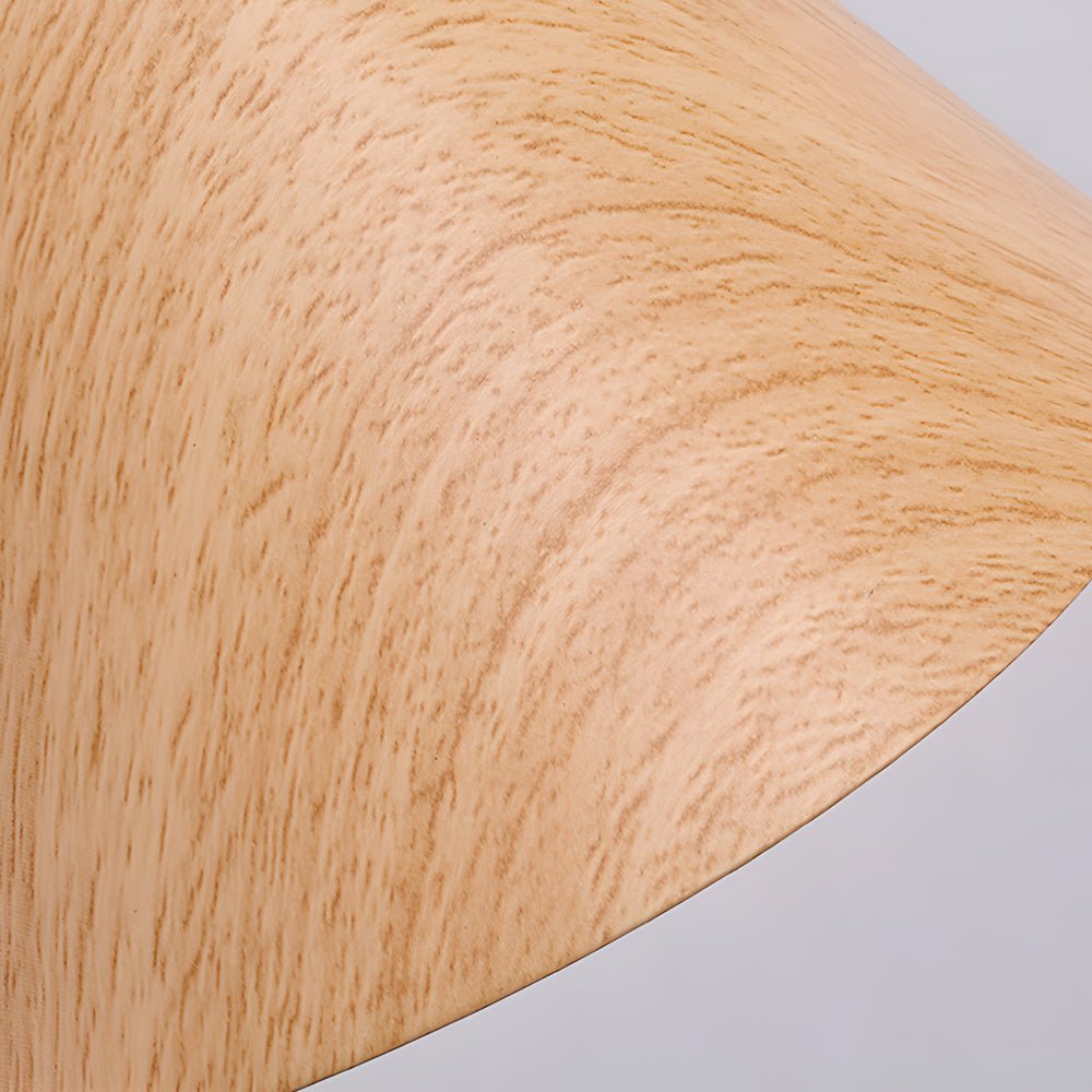 Close-up of the Soren Nordic Swing Arm Wall Sconce wood-grain cone shade texture