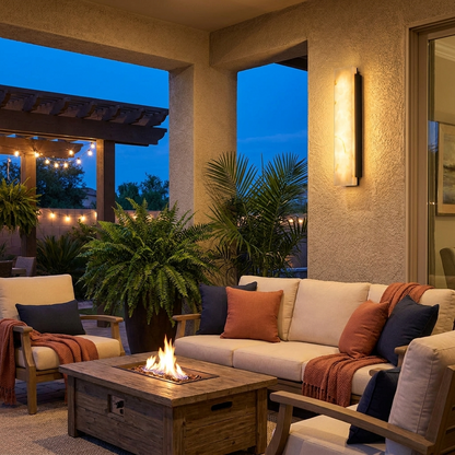 Onyx Outdoor LED Wall Light on a covered patio at twilight