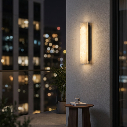 Onyx Outdoor LED Wall Light on a contemporary balcony at night