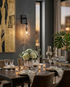 Cascade Crystal Water Drop Wall Sconce Black in dining room