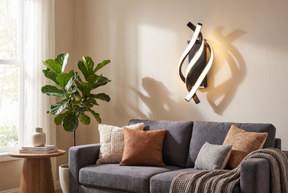 Helix Spiral LED Wall Sconce above a living room sofa