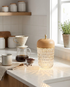 Calice wood cup glass table lamp on a kitchen counter