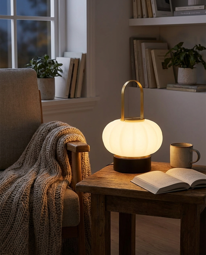 Faro cordless Nordic lantern lamp in a reading nook