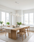 Calyx white Nordic chandelier over a Scandinavian dining table
