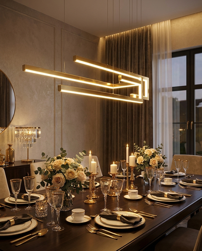 Seryn gold linear chandelier over a formal dining table