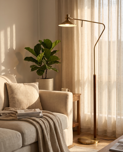 Vintage gold floor lamp in a cozy modern living room reading corner