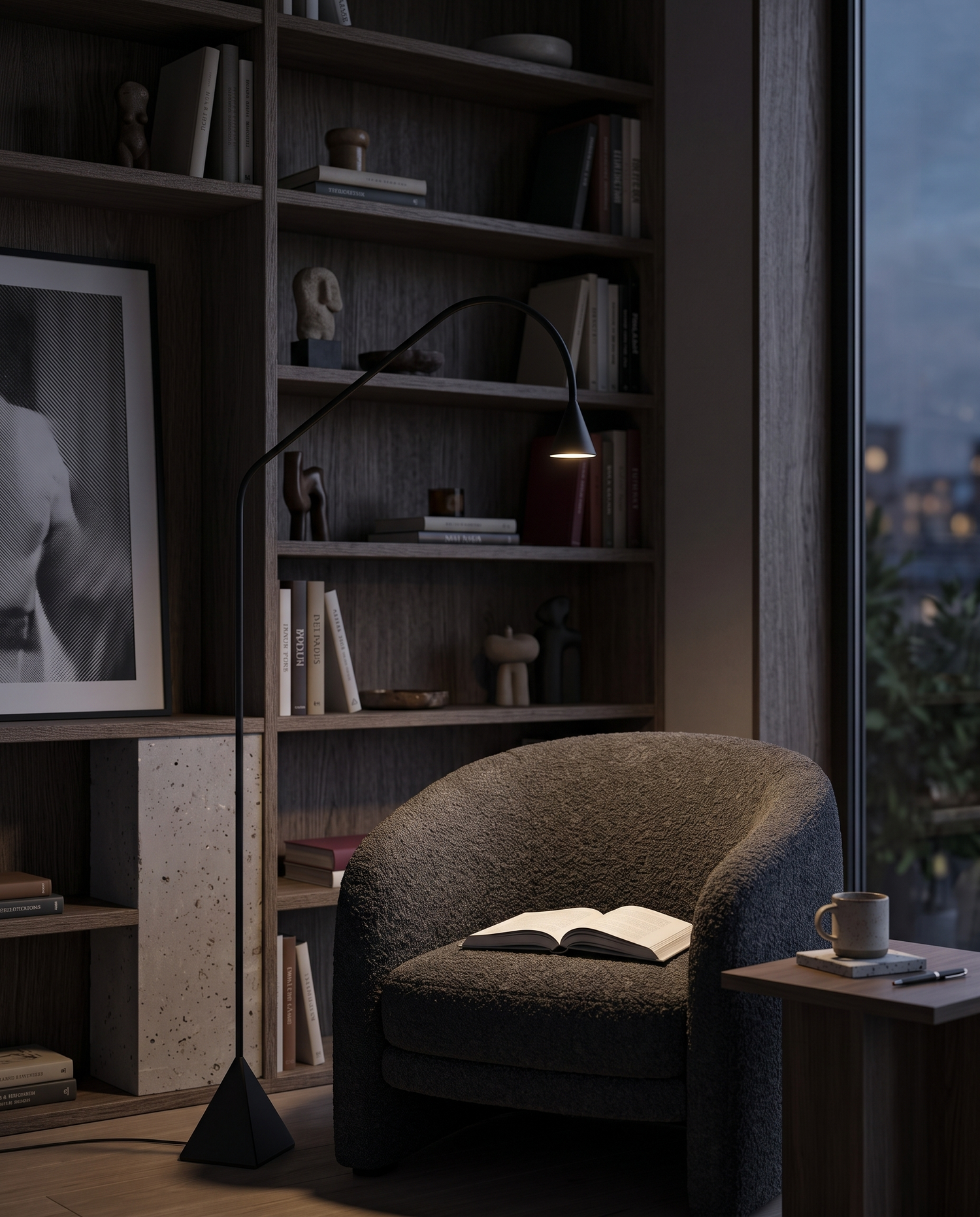 Black arc floor lamp in a home study