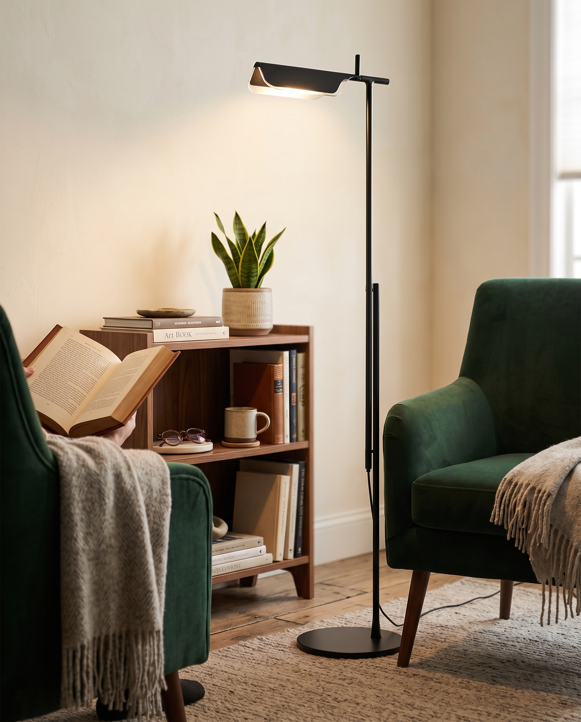 Black Halden floor lamp in a reading corner