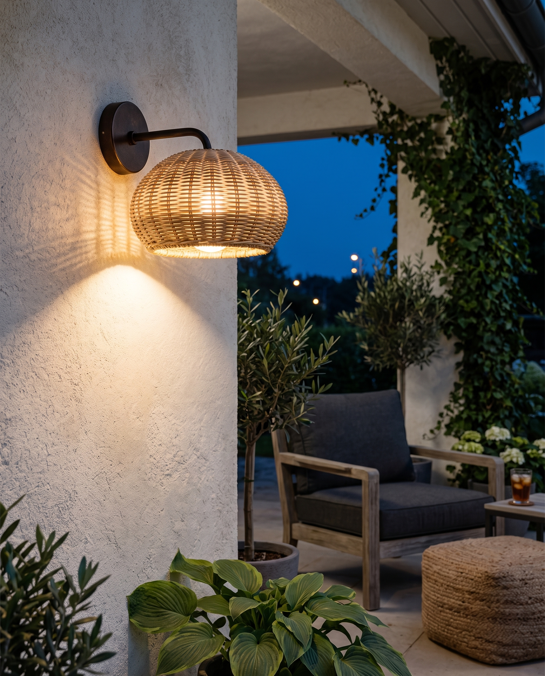 Rattan wall sconce on a covered porch wall