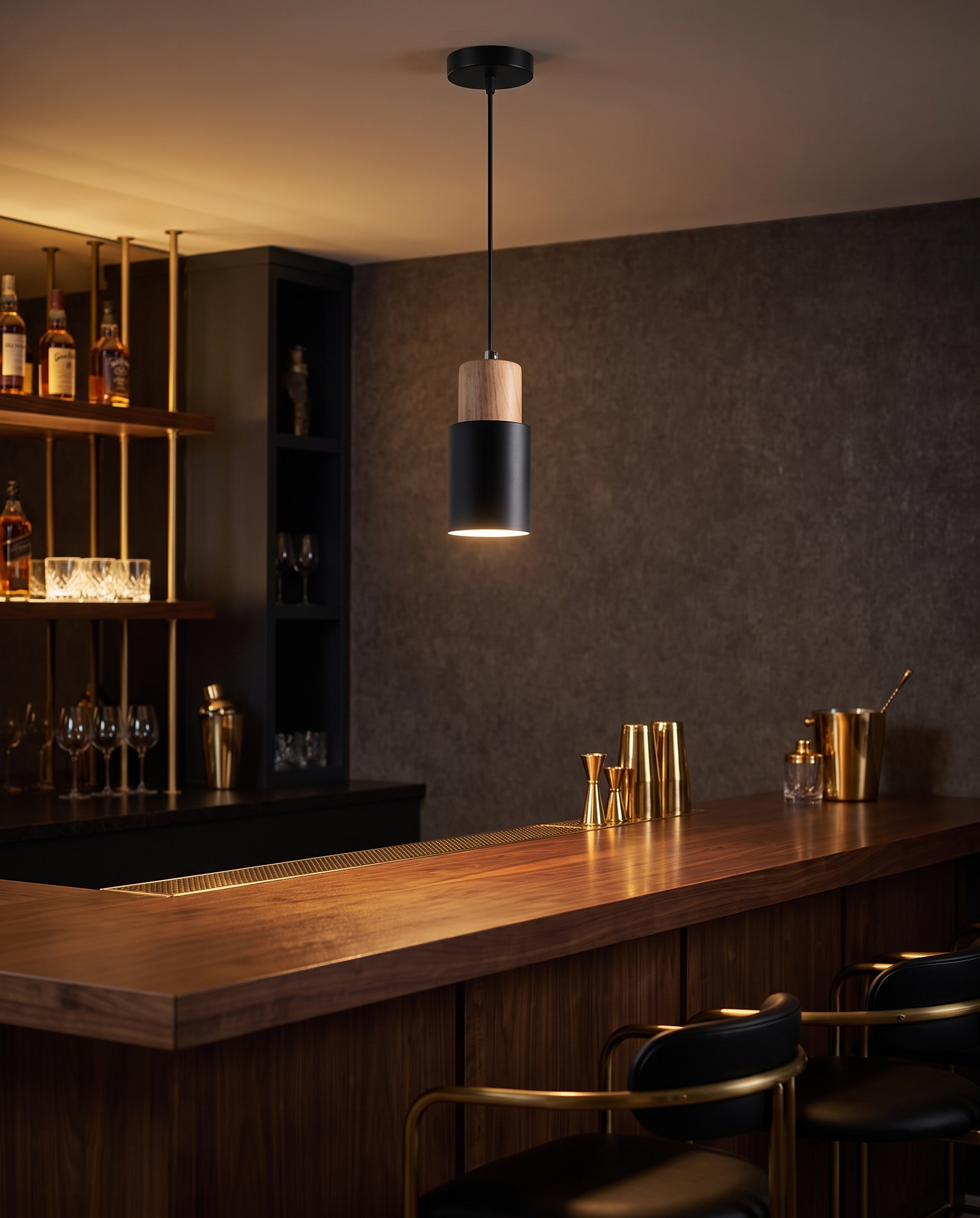 Fika Pendant Light in Black over a home bar counter