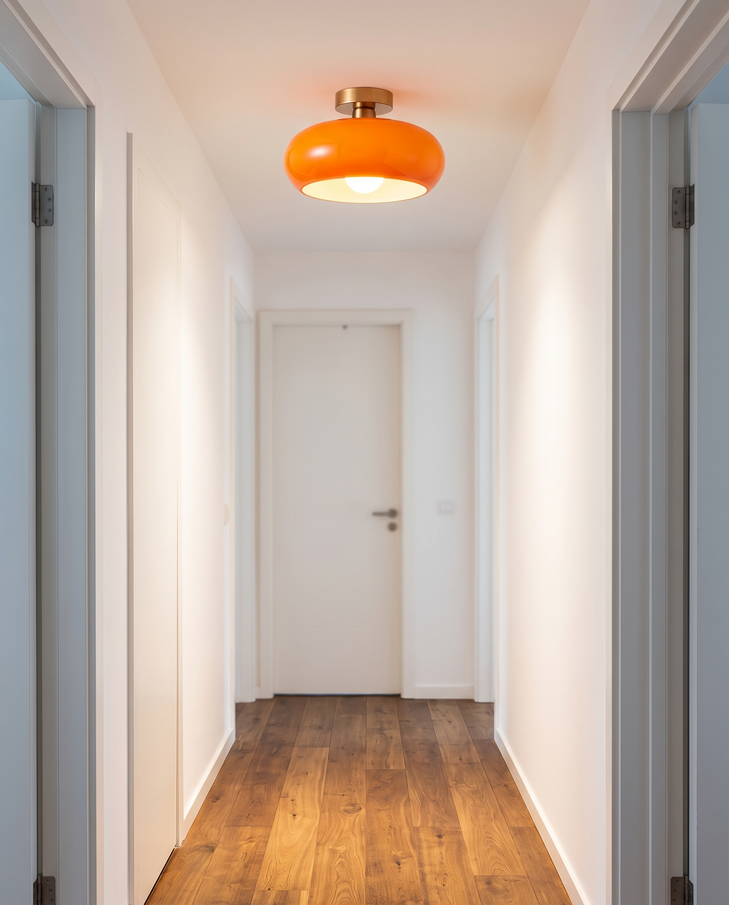 Cobre Glass Ceiling Light in Orange flush mounted in a hallway