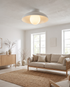 Noor Ceiling Light in White in a living room
