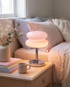 Tarta Table Lamp in Pink on a bedroom nightstand
