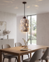 Botte Travertine Pendant Light over a dining table