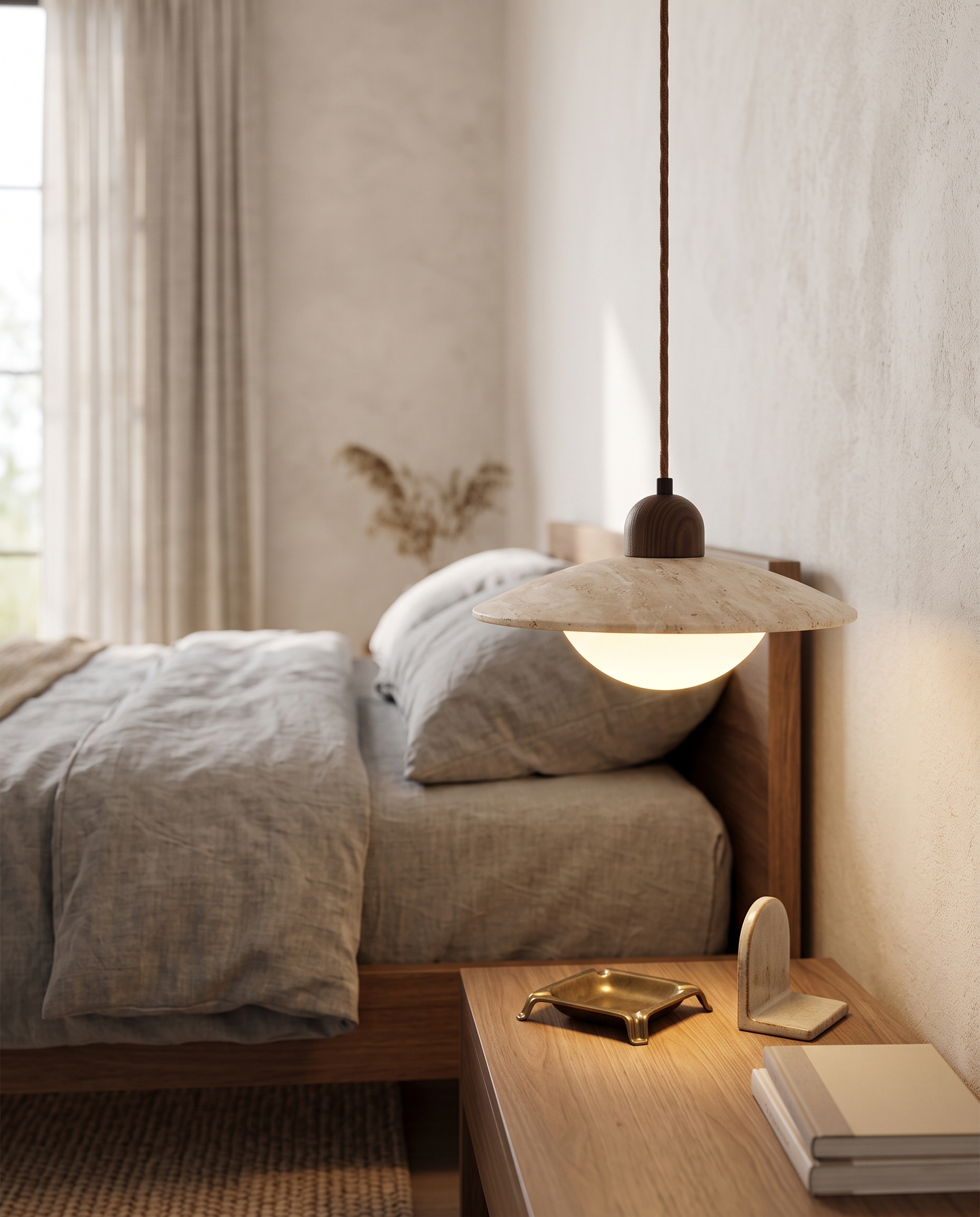 Disco Travertine Pendant Light in a bedroom