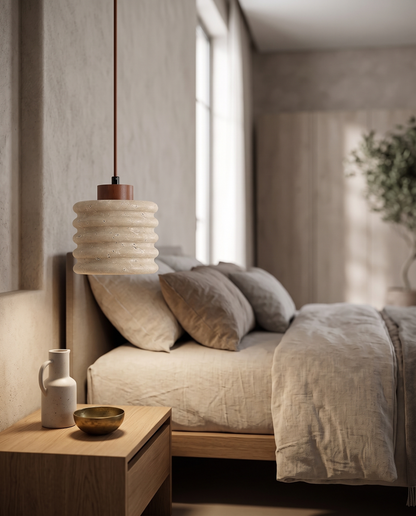 Onda Travertine Pendant Light in a bedroom