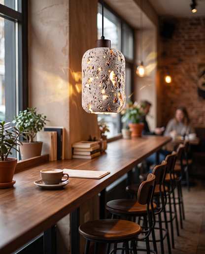 Botte Travertine Pendant Light over a cafe counter