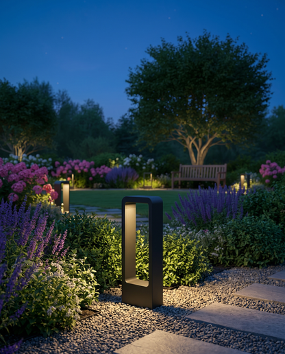 Vialo Outdoor Bollard Light in a courtyard garden
