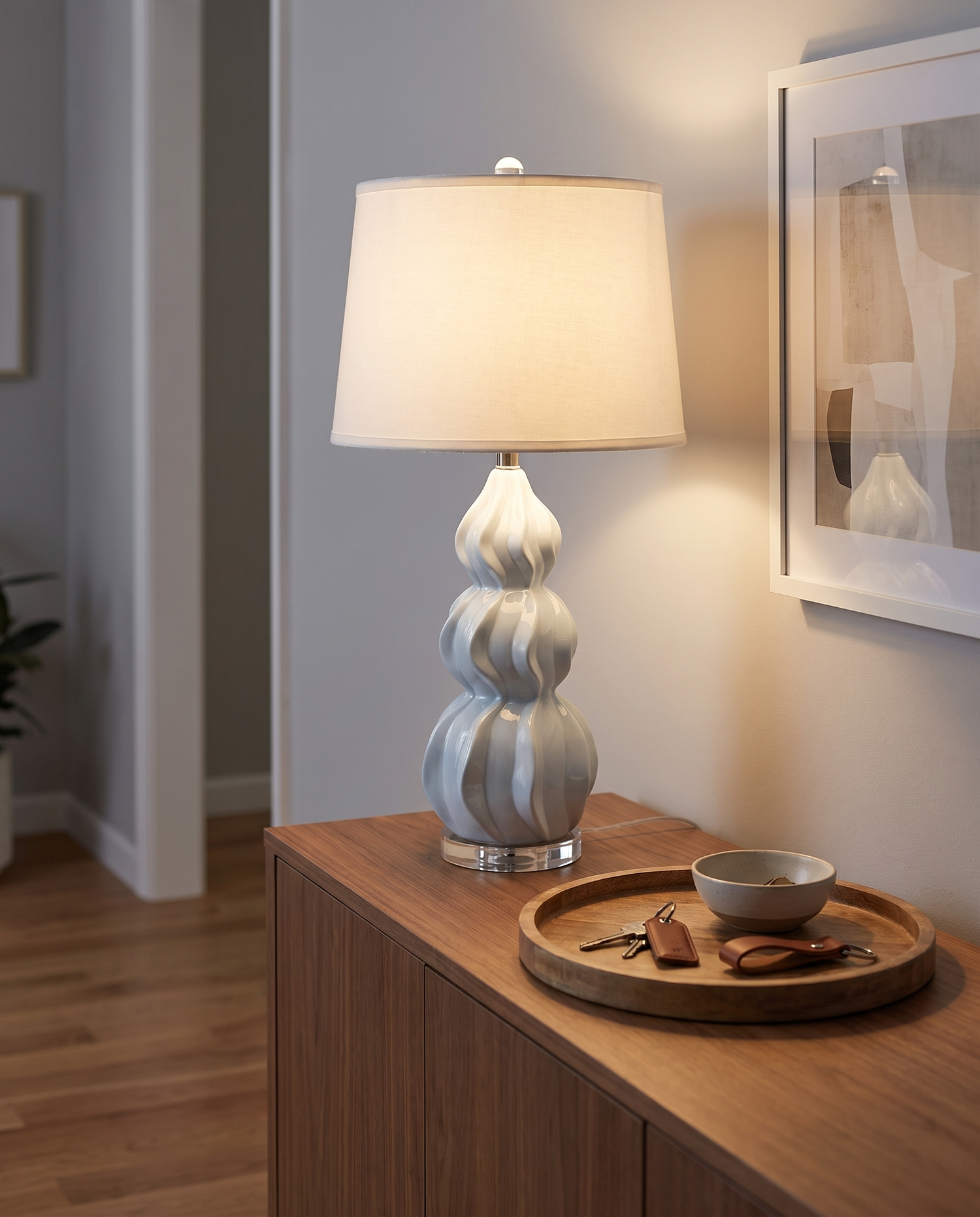 Juno gray-blue ceramic gourd table lamp in an entryway