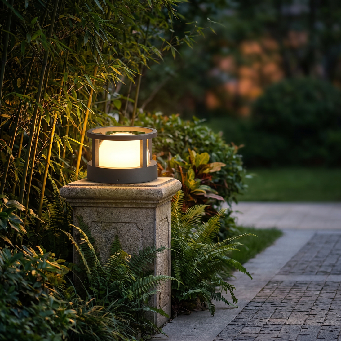 Castel bollard lantern beside a walkway