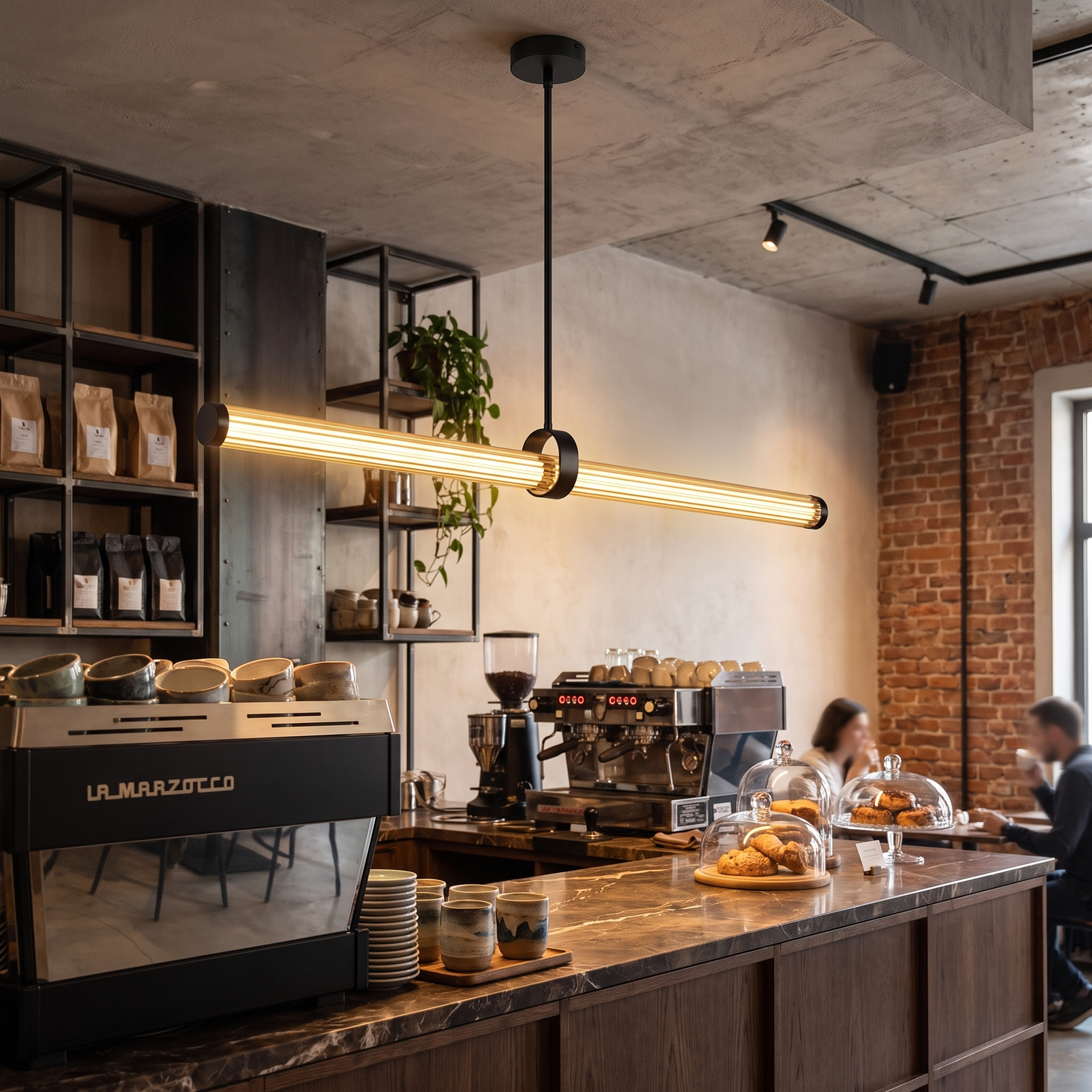 Rialto linear pendant over stylish coffee shop counter