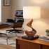 Mira sculptural walnut lamp on mid-century side table
