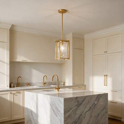 Regent Iron Frame Crystal Chandelier in Copper above a marble waterfall kitchen island