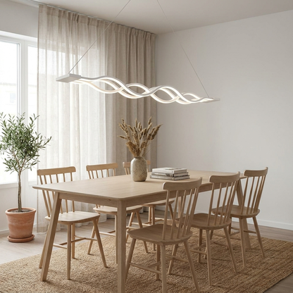 Wilder white multiwave LED chandelier over a Scandinavian oak dining table