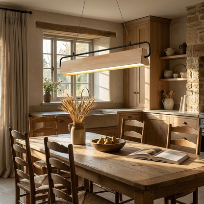 Truett wood rectangle LED pendant light over a farmhouse kitchen table