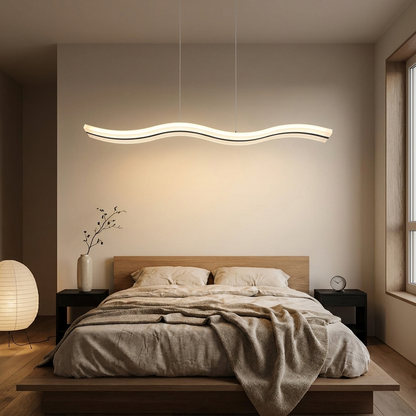 Tallis white acrylic wavy LED pendant light over a low platform bed in a Japandi bedroom