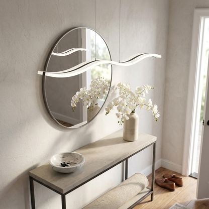 Tallis white acrylic wavy LED pendant light above a console table in an entry hall