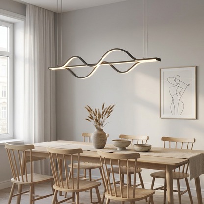 Sloane matte black wave line chandelier over a Scandinavian oak dining table