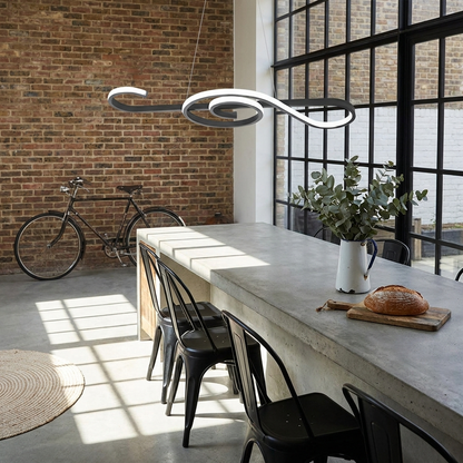 Seymour black musical note LED chandelier in an open plan industrial loft