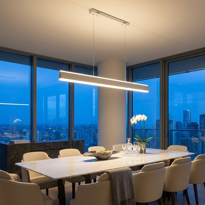 Sinclair white up and down island light over a penthouse marble dining table