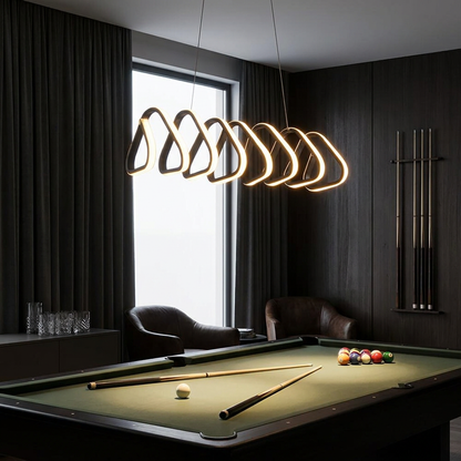 Salford black triangular acrylic LED pendant light over a games room pool table