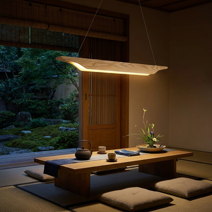 Sheridan natural wood linear LED pendant over a low table in a tatami tea room