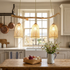 Ruskin natural bamboo three light chandelier in a coastal farmhouse kitchen