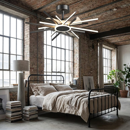Astra Starburst black ceiling fan with light in an industrial loft bedroom