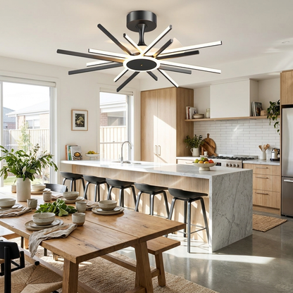 Astra Starburst black ceiling fan with light in an open plan kitchen diner