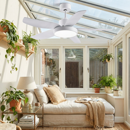 Galene white modern ceiling fan light in a bright garden conservatory