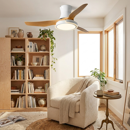 Kestral white and wood grain ceiling fan in a cosy reading corner