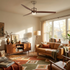 Corvin sand nickel walnut ceiling fan light in a mid century living room